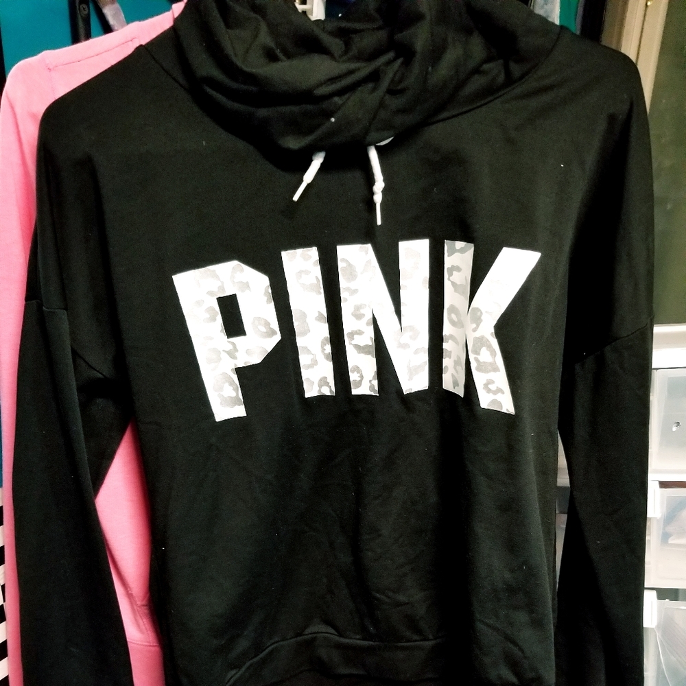 Both Pink sweaters sold as one